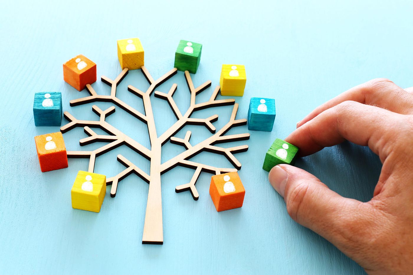 A tree of colorful figures representing an organization and its people